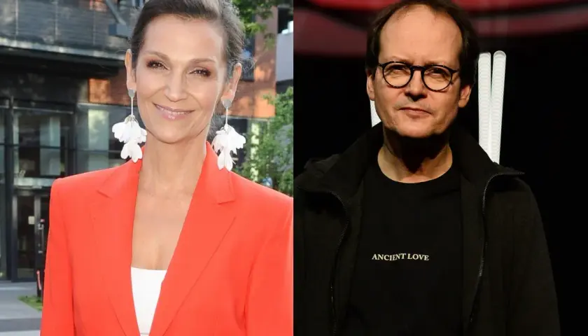 Olga Bończyk z mężem, uśmiechnięta aktorka w pomarańczowej marynarce i mężczyzna w okularach z napisem "Ancient Love".