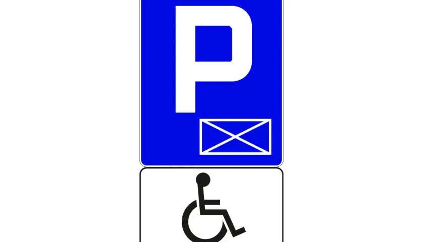Znak drogowy informujący o miejscu dla niepełnosprawnych, z symbolem koperty. Wymiary miejsca parkingowego dla osób z niepełnosprawnościami są kluczowe.