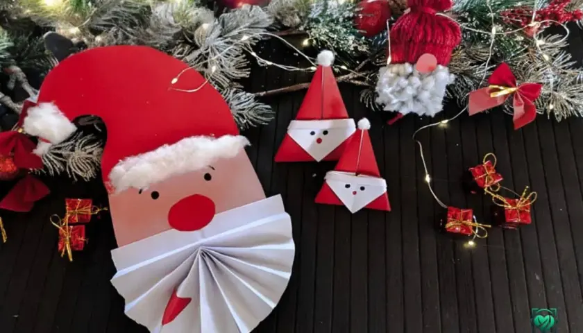 Weihnachtliche Deko: Nikolaus basteln mit Kindern (U3). Papier-Nikoläuse und ein großer Nikolaus-Kopf mit Bart aus Papier.