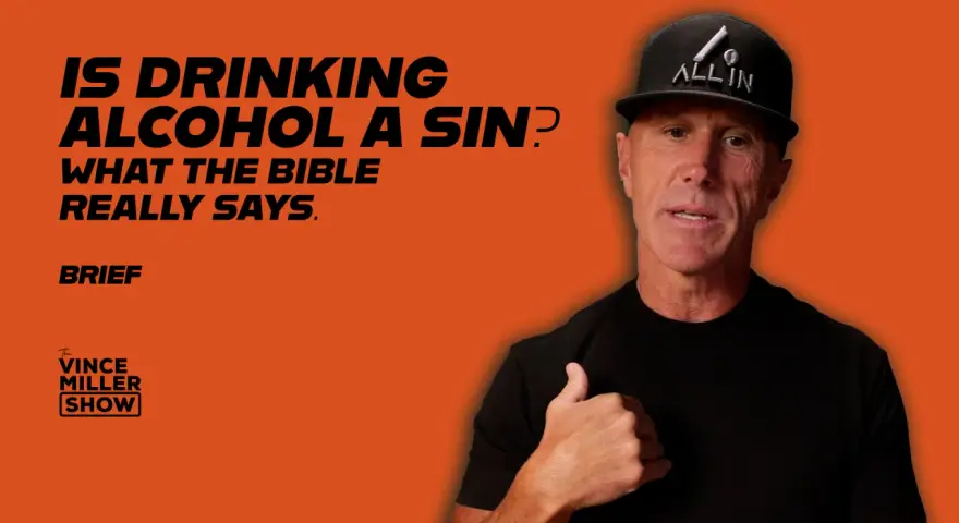 A man in a black t-shirt and "ALL IN" hat discusses if drinking alcohol is a sin, referencing what the Bible says.