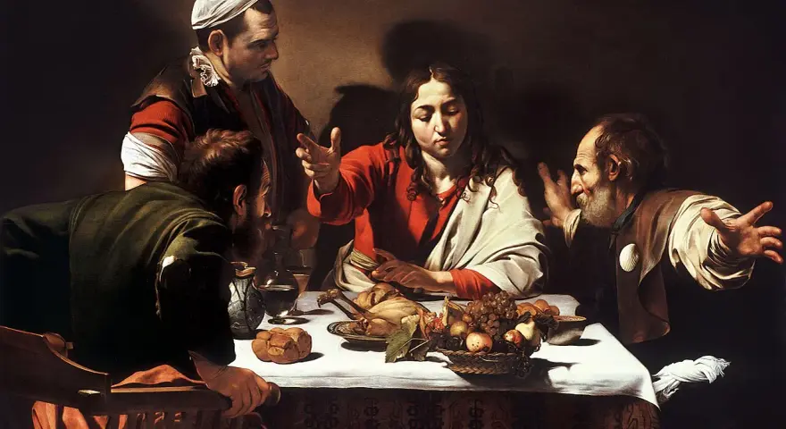 Wieczerza w Emaus Caravaggia: Jezus błogosławi posiłek, a jego towarzysze rozpoznają go w geście zdumienia.