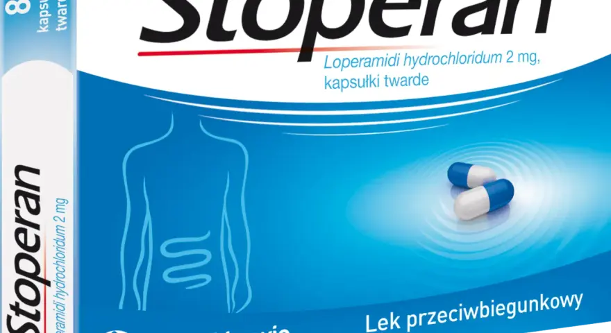 Opakowanie leku Stoperan, zawierające 8 kapsułek twardych. Na niebieskim tle widnieje schemat układu pokarmowego i dwie kapsułki.