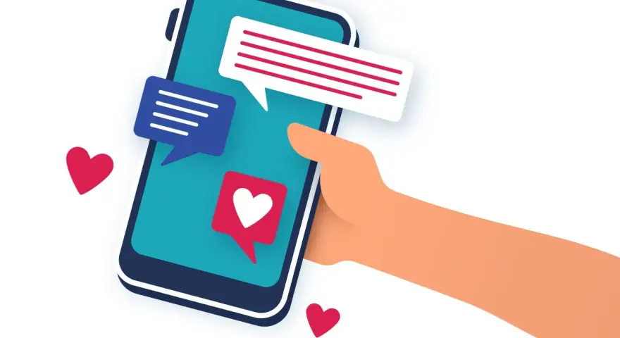 Main tenant une main un smartphone avec des bulles de discussion et des cœurs. L'image évoque le sentiment d'attente et d'espoir après le premier rendez vous.