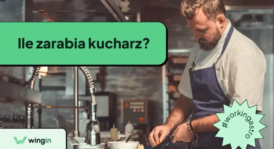 Kucharz w fartuchu przygotowuje jedzenie w kuchni. Czy zastanawiałeś się, ile zarabia kucharz?