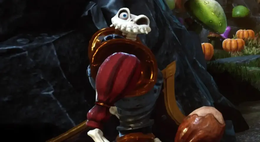 Esqueleto con armadura dorada y roja, listo para la acción en MediEvil PS4.