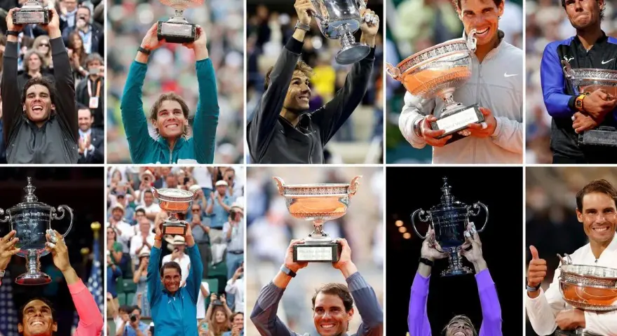 Rafael Nadal, un verdadero campeón de Grand Slam, celebra sus victorias con trofeos icónicos.