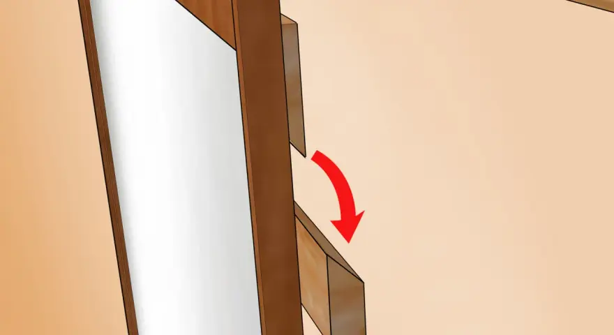 Detalle de cómo colgar un espejo: se muestra un soporte de madera que se desliza hacia abajo para asegurar el espejo.