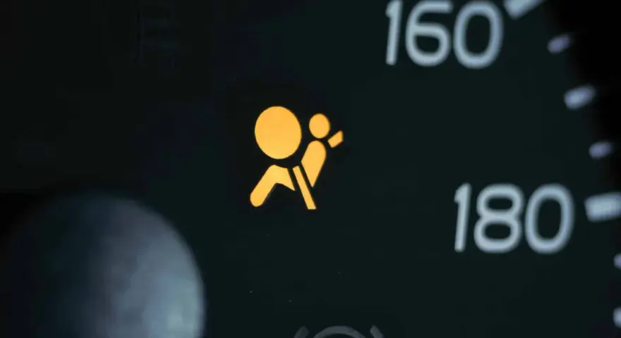 Dashboard warning light indicates a supplemental restraint system problem.