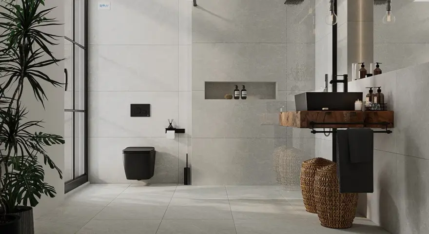 Nowoczesna łazienka z czarną armaturą i roślinnością. Eleganckie układanie płytek 120x60 na ścianie tworzy spójną całość.