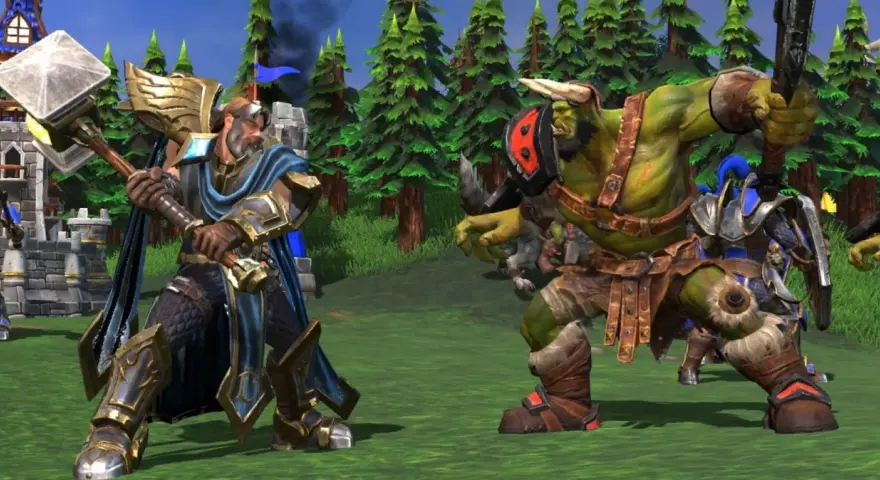 Rycerz z młotem i zielonoskóry ork szykują się do walki. Czyżby szukali kodów do Warcraft 3?
