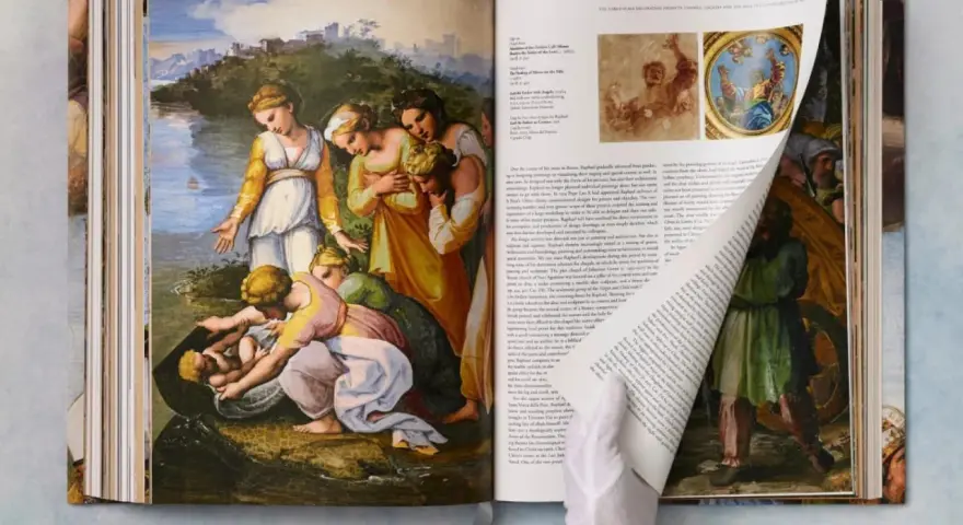 Obras de arte de Rafael Sanzio, como "El hallazgo de Moisés", en un libro abierto.