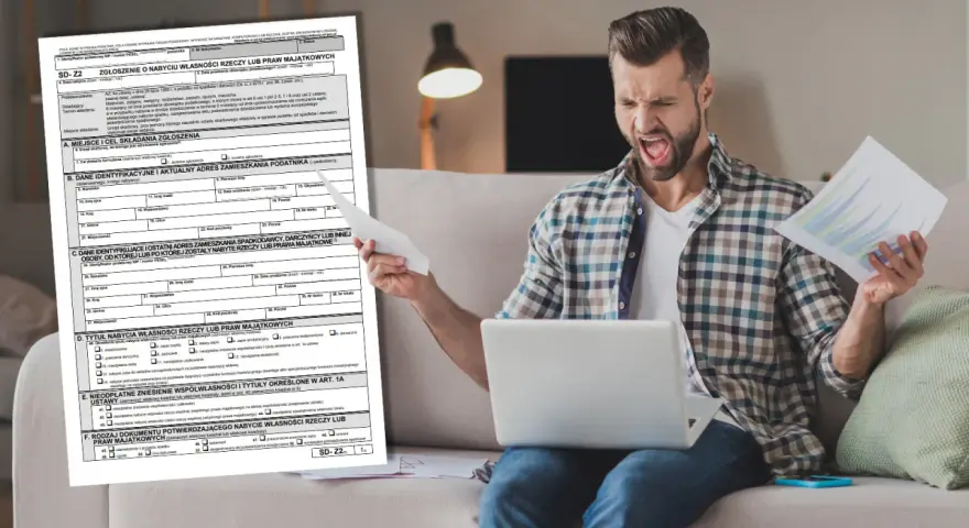 Zirytowany mężczyzna z dokumentami i laptopem. Formularz SD-Z2 dotyczy spadku po rodzicach.