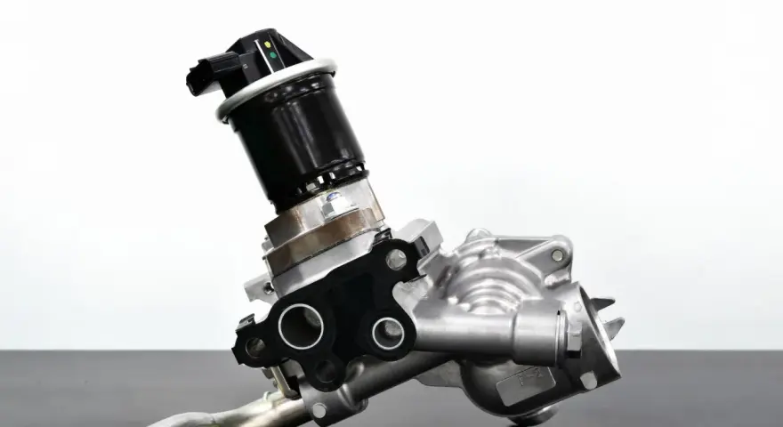 A car's EGR valve, a component that can cause bad EGR valve symptoms if faulty.