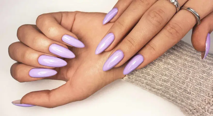 Beautiful lavender acrylic nails, a stylish choice that proves acrylic doesn't have to be expensive.