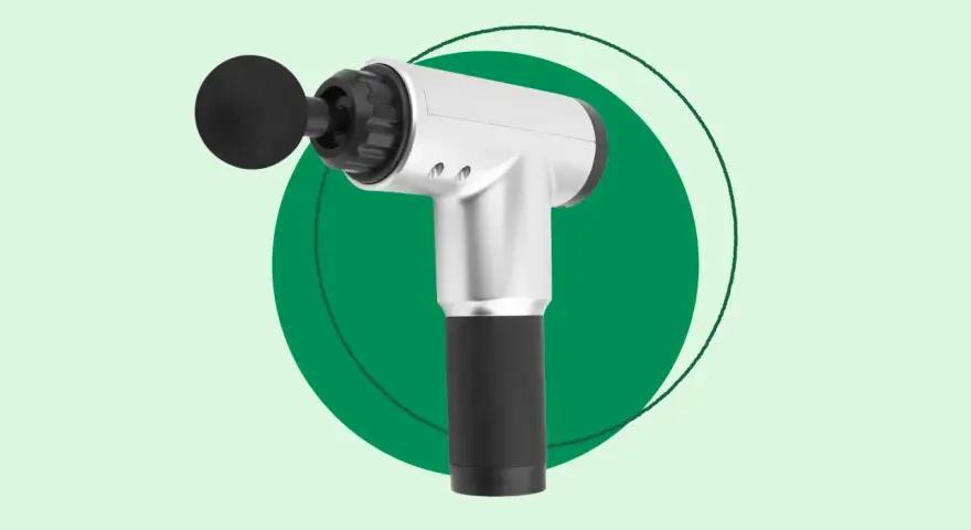 A silver and black handheld massager with a round attachment, perfect for exploring how handheld massagers work for muscle relief.