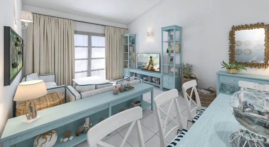 Un soggiorno in stile marinaro con mobili azzurri, cuscini a righe, ancore decorative e un tocco di stile da polo e scarpe da barca.
