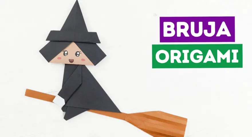Bruja de origami volando en escoba, ideal para manualidades de Halloween con papel.