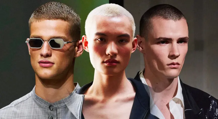 Tre uomini con taglio buzz cut uomo, uno con occhiali scintillanti, uno con capelli biondo platino e uno con sguardo intenso.
