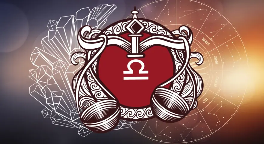 Symbol Wagi, tuż przed zodiakalnym Skorpionem, otoczony kryształami i kołem zodiaku.
