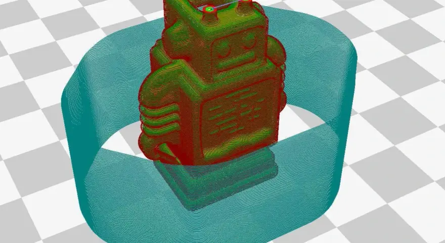 Model robota na drukarce 3D, otoczony niebieską obwódką. To pokazuje, co to adhezja, czyli przyczepność wydruku do stołu.