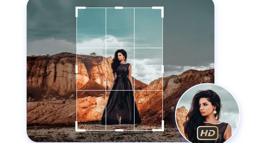 Une femme en robe noire pose dans un paysage désertique, prête à recadrer l'image pour un rendu parfait.