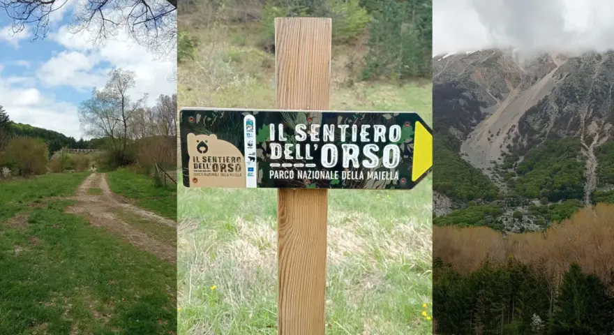 Segnale del sentiero dell'orso nel Parco Nazionale della Maiella, con un sentiero sterrato e montagne sullo sfondo.