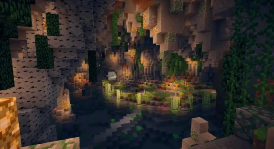 Un mundo subterráneo de Minecraft con cascadas, vegetación exuberante y luces brillantes. ¡Una de las mejores semillas Minecraft para explorar!
