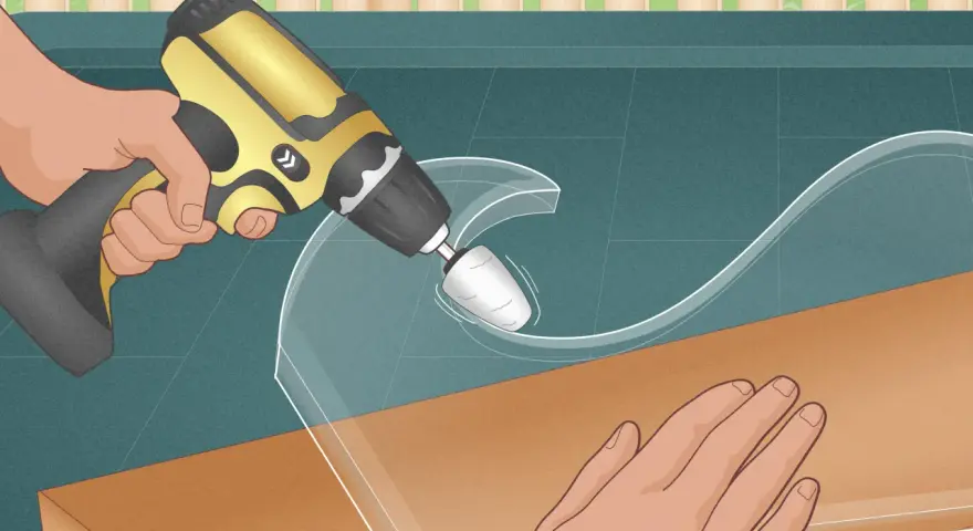 Using a rotary tool to carefully shape a piece of plastic, demonstrating how to cut plastic glass for a custom project.