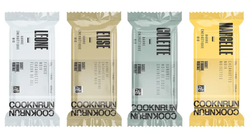 Quatre barres énergétiques bio Cooknrun : Léone (figue, noix, cacahuète, fleur de sel), Élise (chocolat noir, avoine, cacahuète), Colette (banane, noix de coco, chia), Marcelle (cacahuète, noisette). Un parcours nutritionnel savoureux.