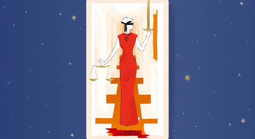 La Justicia, carta 11 del tarot, con venda en los ojos, sostiene una balanza y una espada.