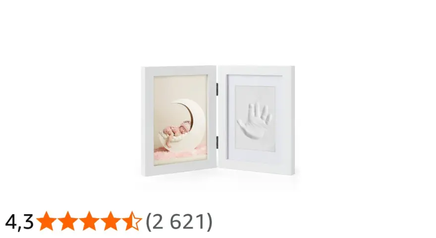 A white diptych frame showing a sleeping baby on a moon and a baby handprint.