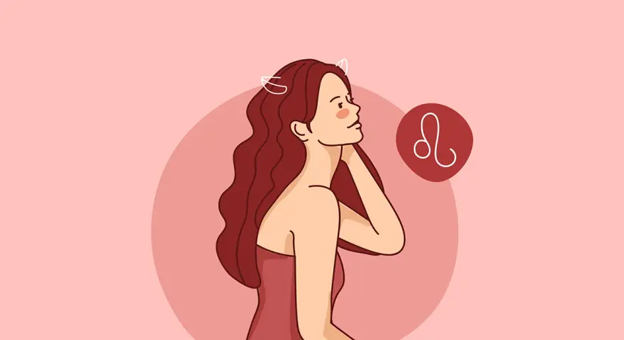 Kobieta z długimi włosami i symbolem Lwa. Jej postawa sugeruje pewność siebie, typową dla lew znak zodiaku charakterystyka.