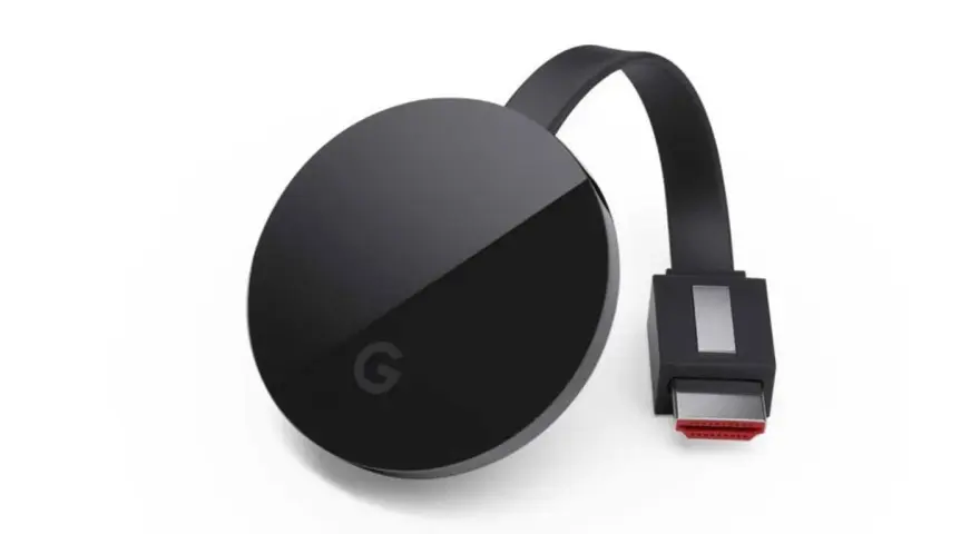 Czarny Chromecast z logo Google i kablem HDMI. Dowiedz się, jak podłączyć Chromecast do telewizora.