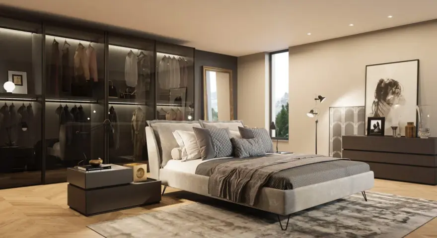 Camera da letto moderna con comò scuro, specchio dorato e un armadio a vista. Ideale per ispirazione su cosa mettere sul comò della camera da letto moderna.