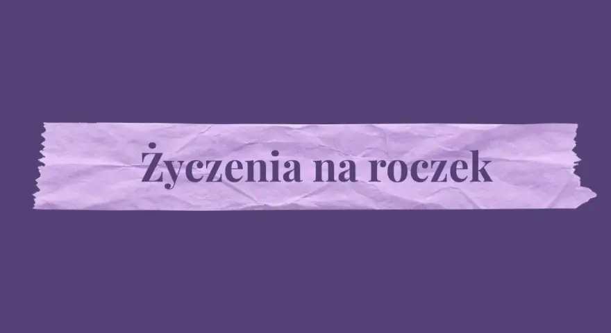 Fioletowa taśma z napisem "Życzenia na roczek". Idealna do ozdobienia kartek z życzeniami.