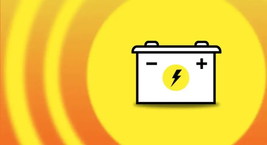 A car battery icon on a yellow background with orange rings. Does disconnecting battery clear codes?