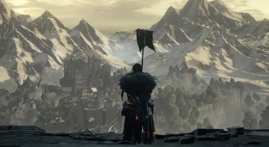 Un guerrero con armadura y un estandarte observa un castillo en ruinas y montañas nevadas. Un paisaje épico para tu **Dark Souls 3 guía**.