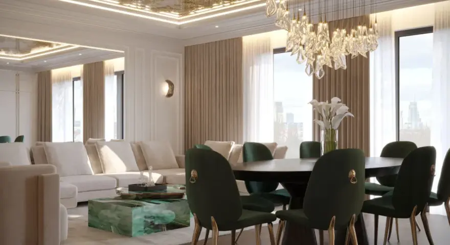 Luksusowy salon z zielonymi krzesłami i sofą. Złoty, wzorzysty sufit napinany dodaje elegancji, choć jego wady mogą być widoczne z czasem.