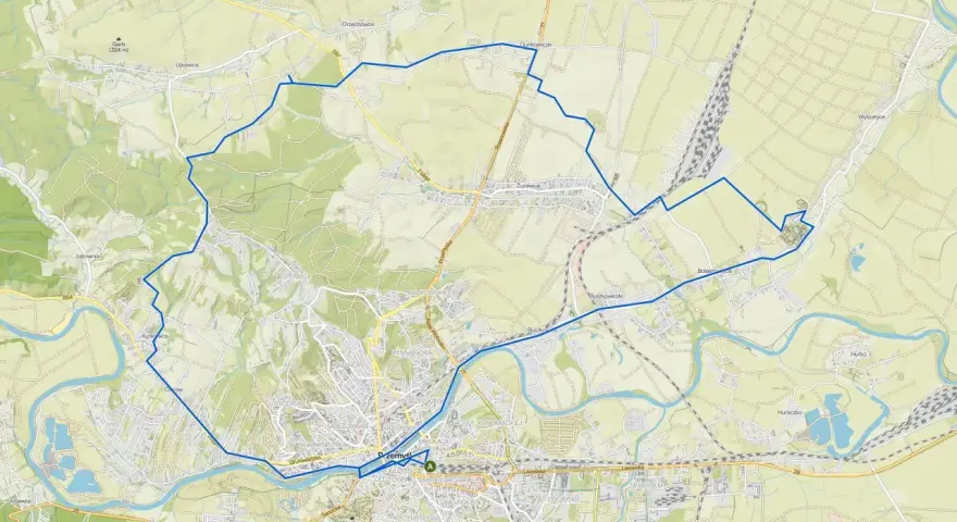 Mapa z zaznaczoną pętlą tras rowerowych w Polsce, prowadzącą przez tereny zielone i okolice Przemyśla.