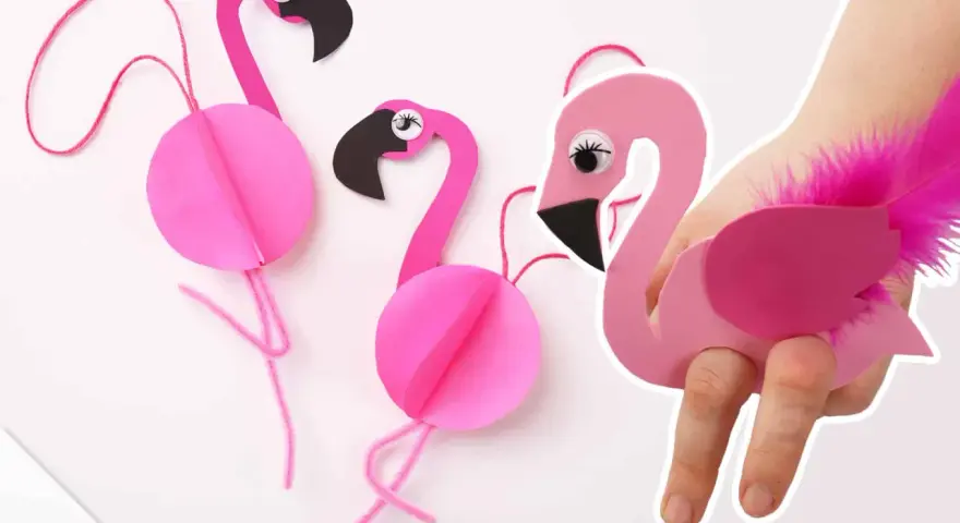 Pink paper flamingos, perfect for flamingo basteln! One is worn on a hand like a puppet, adorned with a fluffy pink feather.