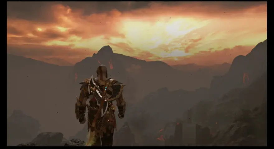 Kratos, el dios de la guerra, contempla el paisaje infernal de Muspelheim bajo un cielo ardiente.