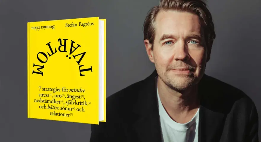 Stefan Pagréus bredvid boken "Tvärtom" som ger strategier för att måla snabbt och hantera stress.