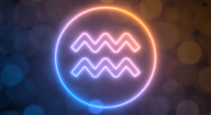 Neonowy symbol Wodnika otoczony poświatą. Wodnik cechy charakteru: niezależność, innowacyjność, humanitaryzm.
