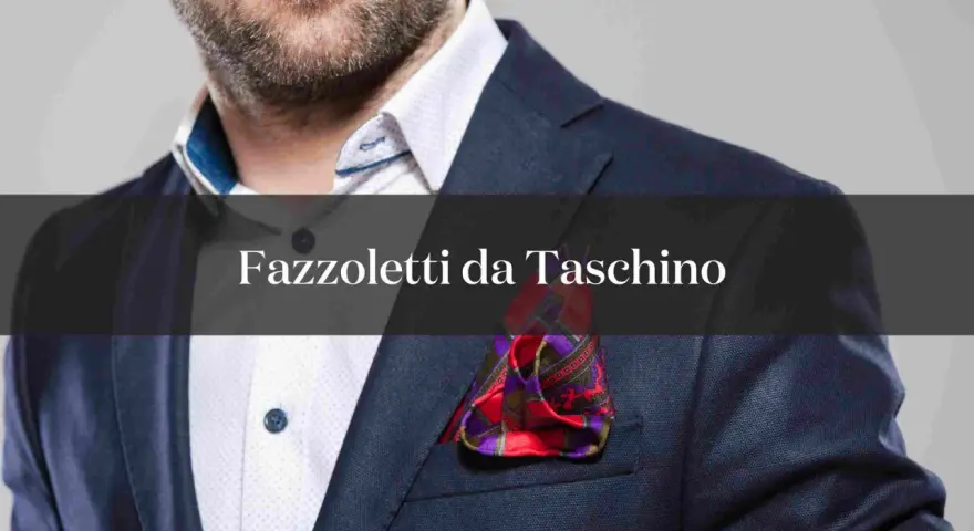 Un uomo indossa un abito blu con un fazzoletto nel taschino, un tocco di stile che completa il look.