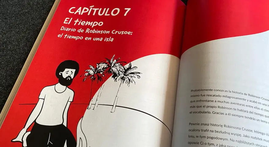 Hiszpański podręcznik z rozdziałem o Robinsonie Crusoe. Ilustracja przedstawia rozbitka na wyspie.