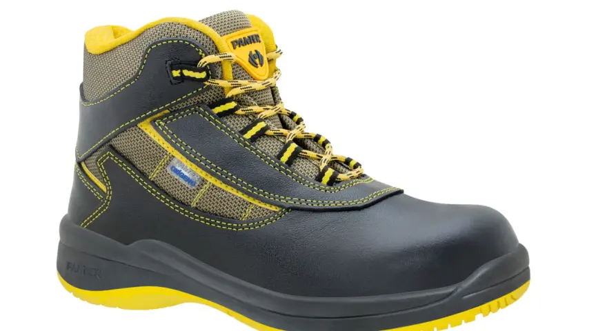 Bota de seguridad negra y amarilla, ideal para aliviar dolor de pies por botas de seguridad. Confort y protección garantizados.