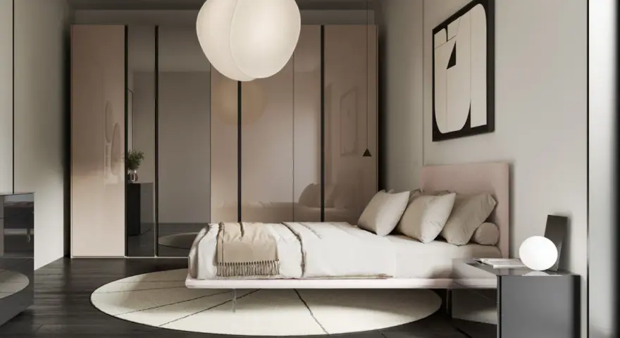Camera da letto in una casa moderna, con letto rosa, armadio a specchio e lampada a sospensione.