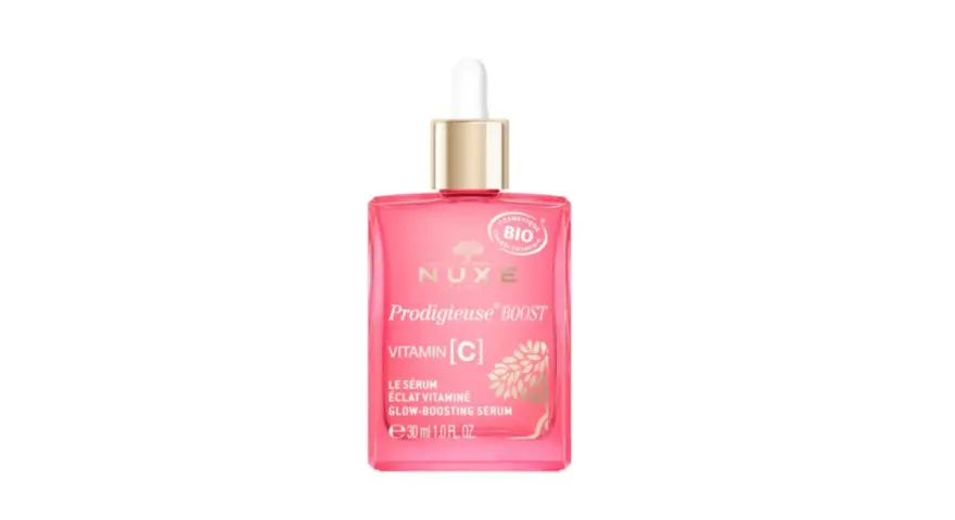 Siero Nuxe Prodigieuse Boost con Vitamina C per una pelle luminosa e rivitalizzata. Flacone rosa con contagocce.