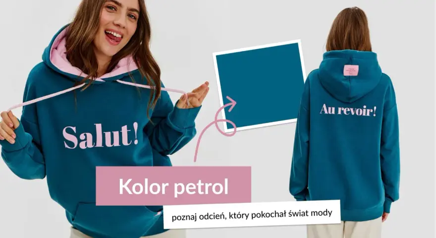 Dziewczyna w bluzie w kolorze petrol, z napisem "Salut!" z przodu i "Au revoir!" z tyłu.