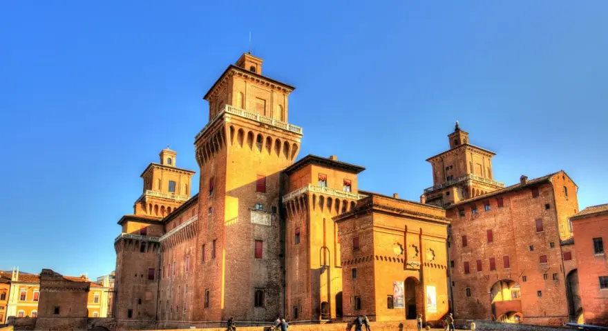 Castello Estense in Ferrara, a stunning brick fortress, is one of the best day trips from Bologna.